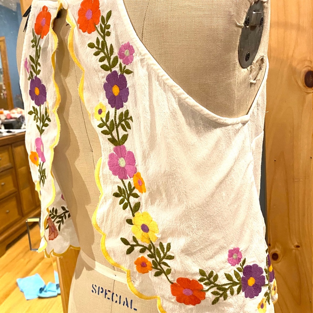 Open back racer tank with embroidery